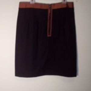 Wool, straight line, pleated, thighlength skirt